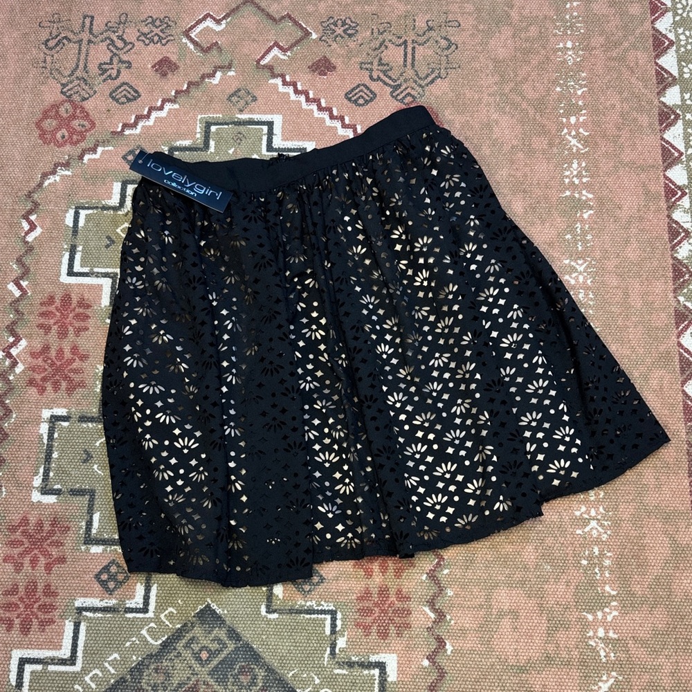 NWT Lovely girl Black Mini Skirt with Cutouts on the Outer Layer/a Gold Satin